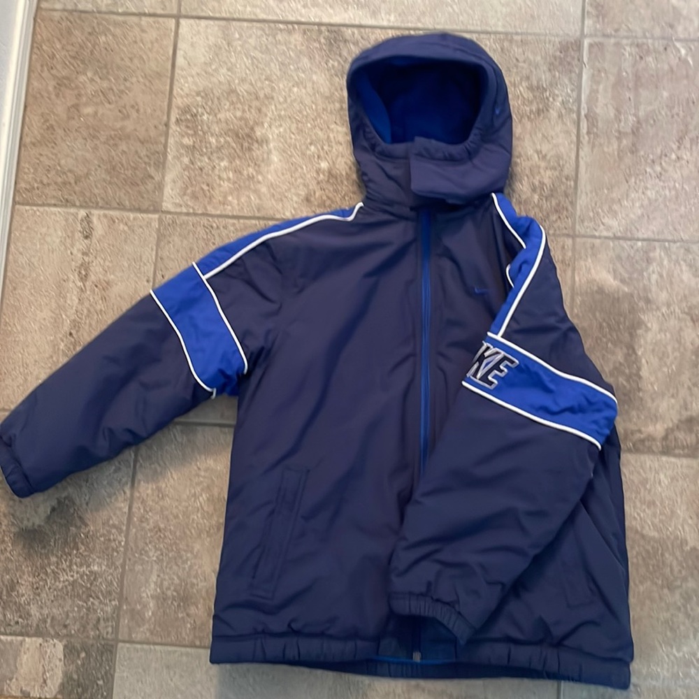 Nike, light/dark blue heavy weight jacket. Fleece lined